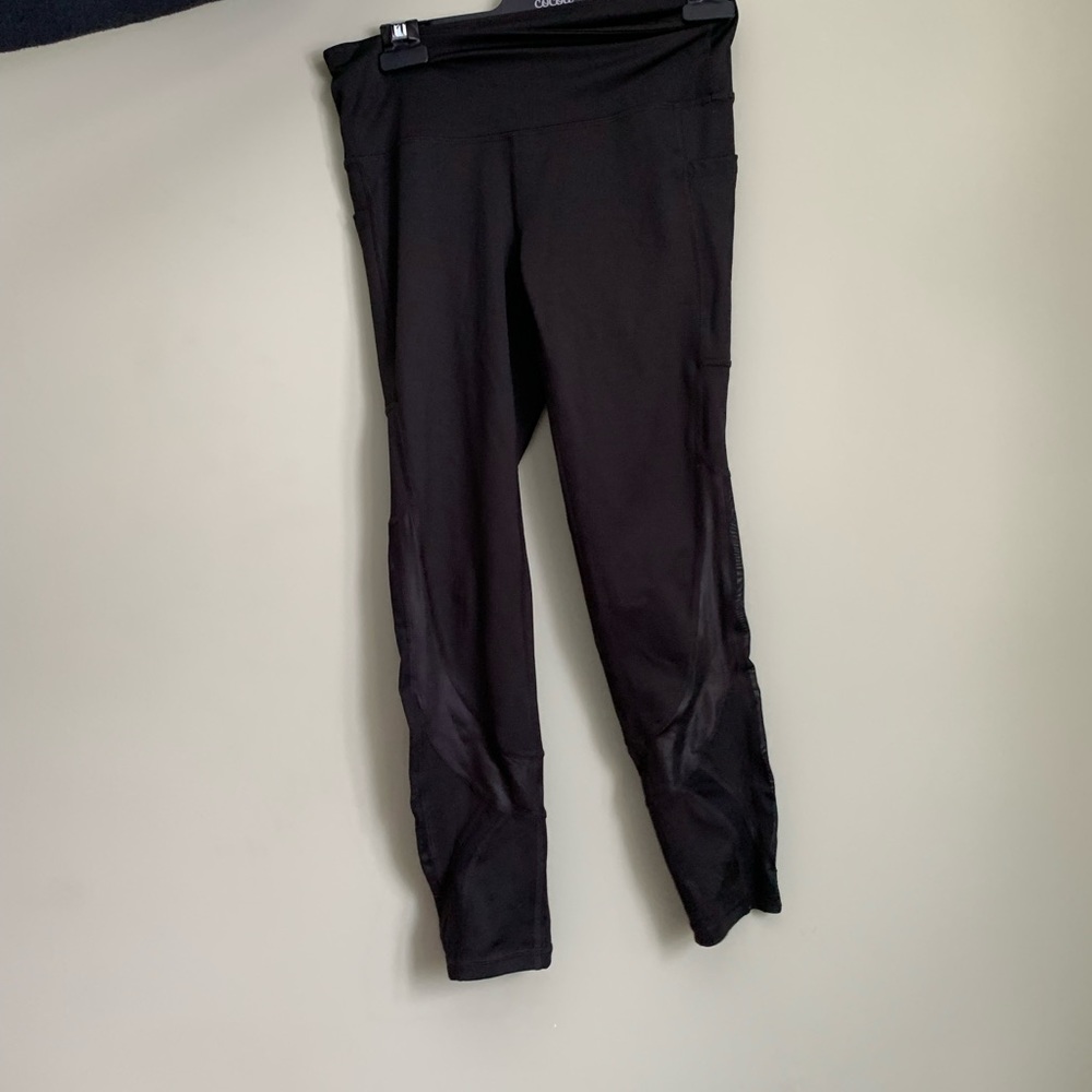 Black workout leggings with mesh detail